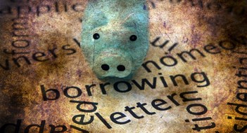 Co-op & Condo Financing Piggy bank and borrow grunge concept