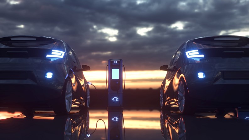 Electric cars charging at a charging station. 3d rendering.