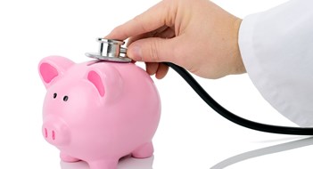A financial check with a stethoscope isolated on a white background