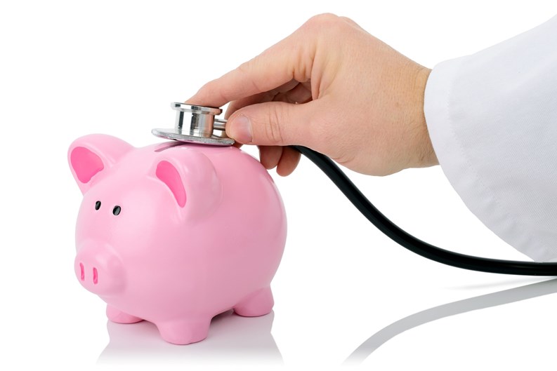 A financial check with a stethoscope isolated on a white background