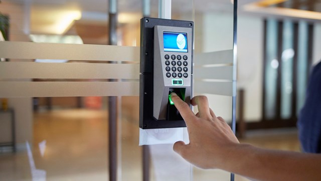 Yong man push down the electronic control machine to access the door