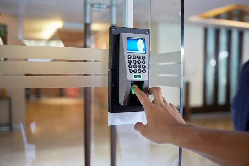 Yong man push down the electronic control machine to access the door